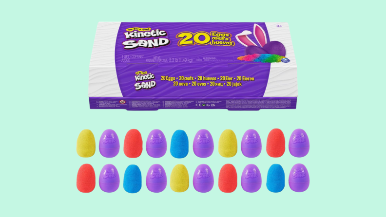 A purple package of Kinetic Sand arrayed above two rows of variously colored eggs that contain the sand.