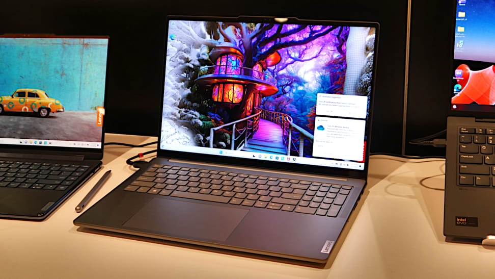 Looking at the Lenovo yoga pro 9i, a 2-in-1 convertible laptop, on a table