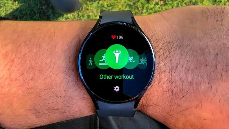 A Samsung Galaxy Watch on a man's wrist.