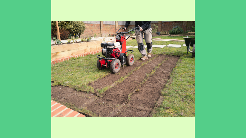 A man operating a motorized sod cutter.