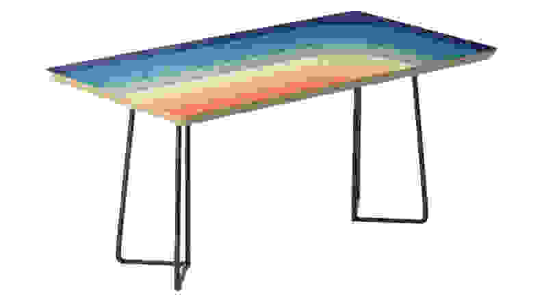 Table with rainbow pattern on top.
