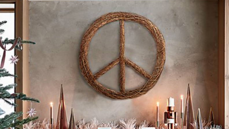 Woven twig wreath in the shape of a peace sign