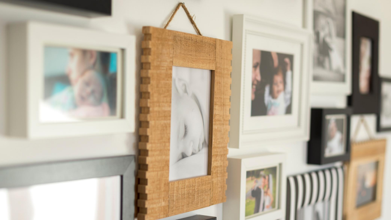 Collection of framed photos on a wall