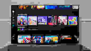 The Samsung S95F OLED TV with games on its bright screen