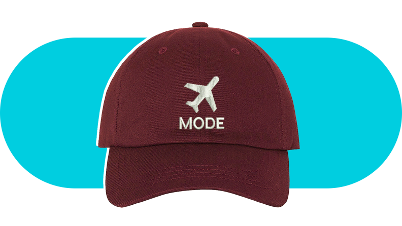 Maroon baseball cap that reads "Airplane mode."