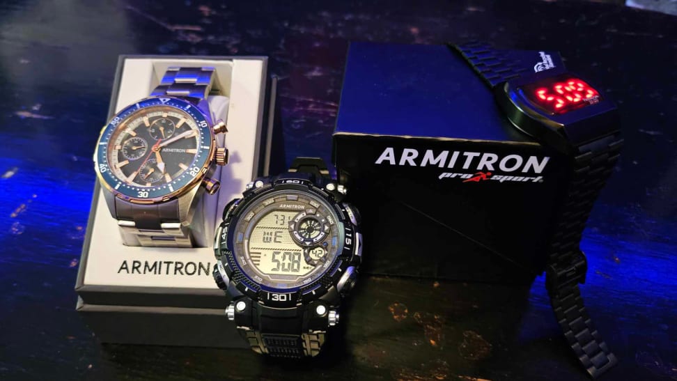 A close-up of three Armitron watches, all pointing around 5am.