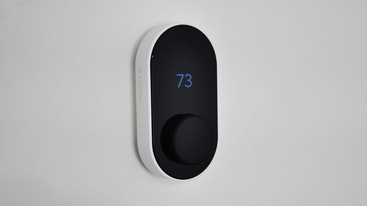 Wyze Thermostat against white wall