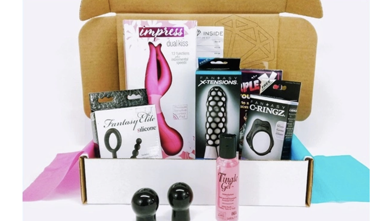 A box of sex toys and accessories