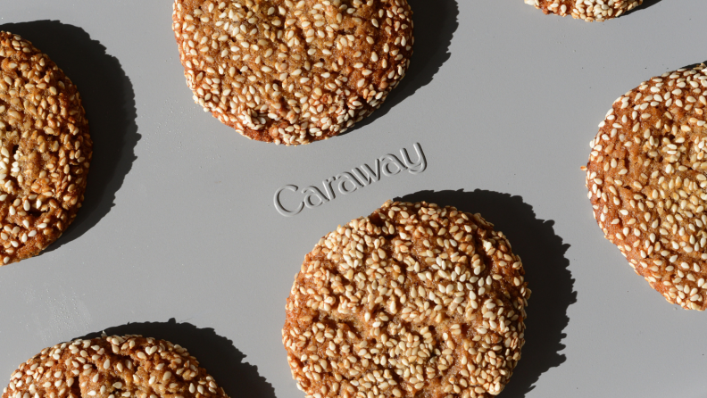 A grey Caraway baking sheet with cookies on top