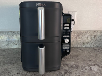 The Ninja Double Stack XL Air Fryer on a countertop surface.