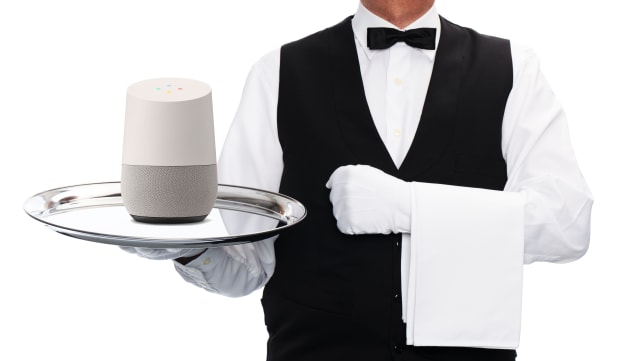 Butler with Google Home on a silver platter