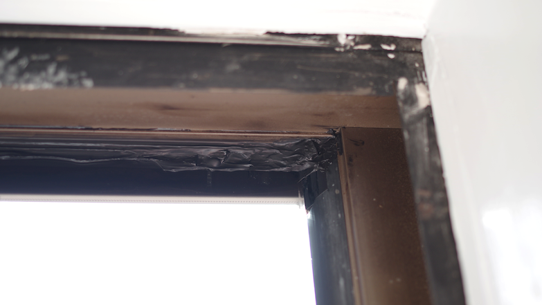 Black caulk better insulates a window