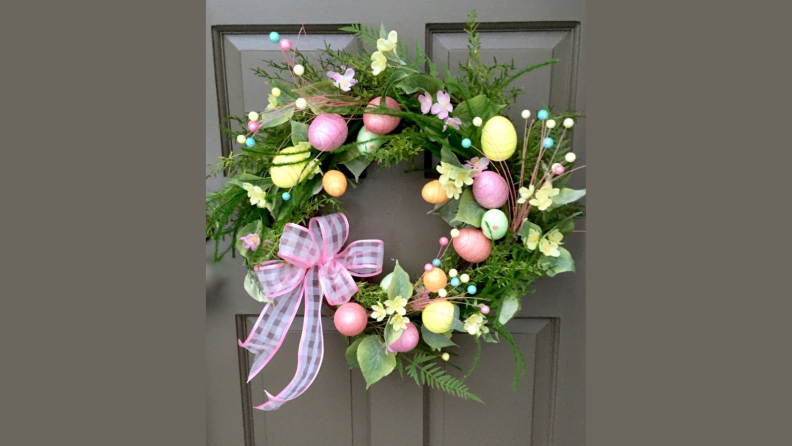 An Easter wreath hanging on a door