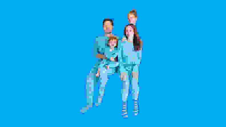 A family wearing the Wondershop Hannukkah matching family pajama set.