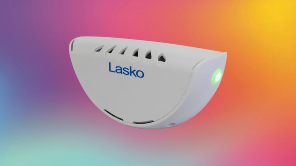 A white Lasko fridge ionizer on a rainbow gradient background.