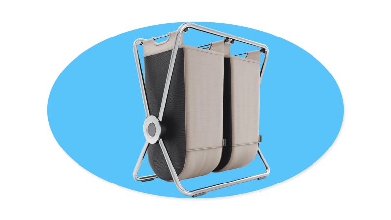 Simplehuman hamper on a blue background