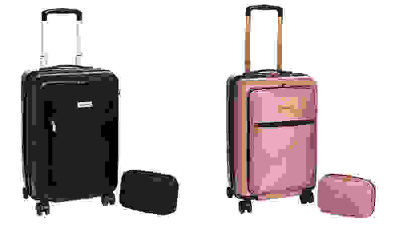白色背景上的黑色和粉色行李箱