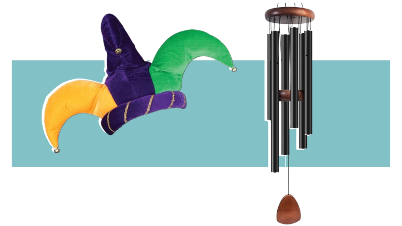 A colorful jester hat with bells next to Bursvik black, tubular wind chimes on a colorful background