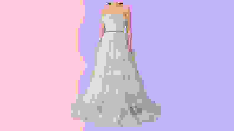 A long and flowy strapless light blue wedding dress.