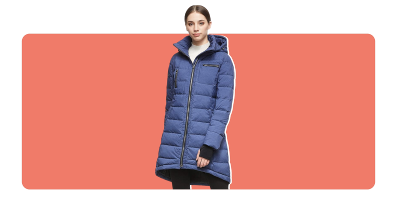 Model wearing a dark blue Orolay Thickened Down Jacket zipped up.