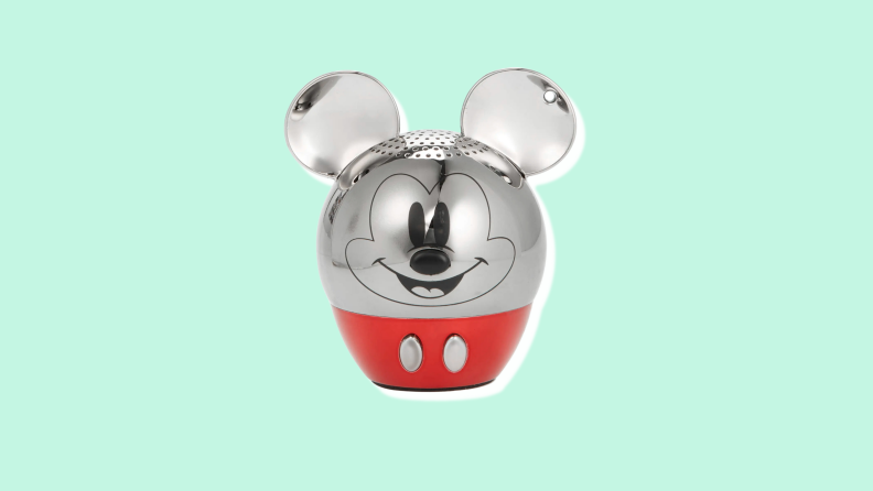 A shiny metal speaker with Mickey ears and a Mickey face.