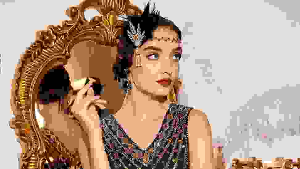 Photo of a model in a sequined flapper-style dress.