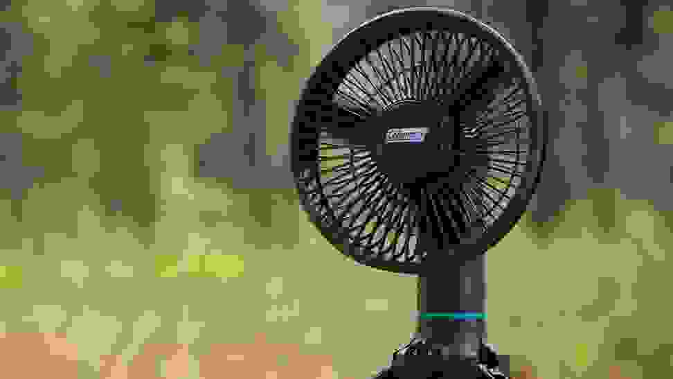 A portable fan being used outside.