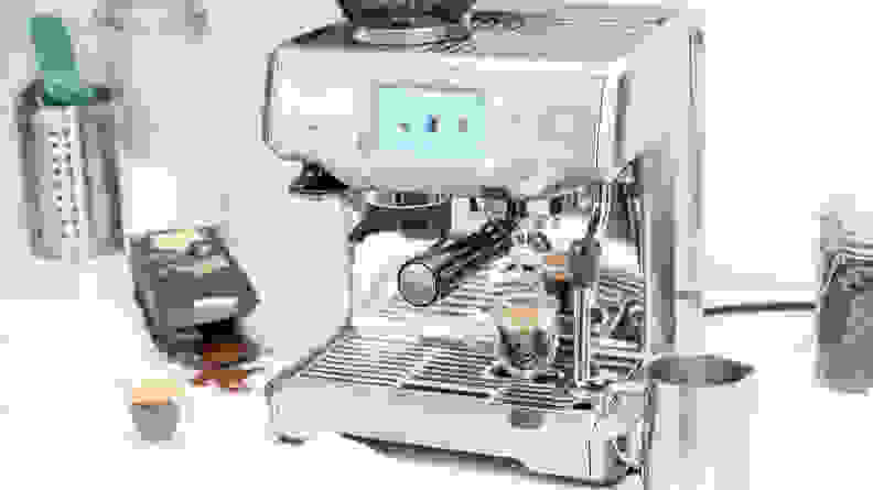 Breville Touch espresso machine sitting on counter.
