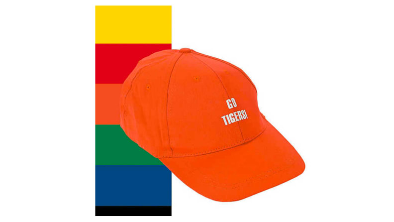 An orange cloth baseball cap that says 