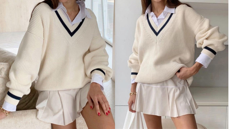 Two images of the same white v-neck sweater with black detailing around the wrists and neckline.