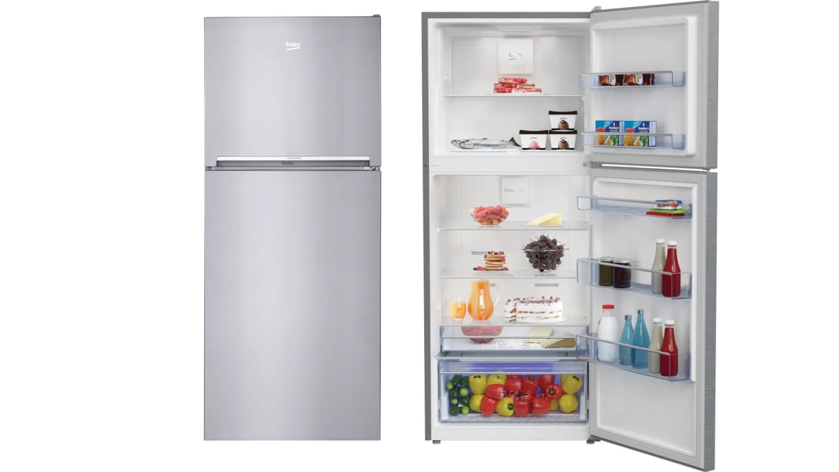Two instances of the Beko fridge in a white void. On the left its doors are closed, showcasing its exterior. The second has its door open, showcasing its internal storage. Each bin and shelf is fully stocked with food.