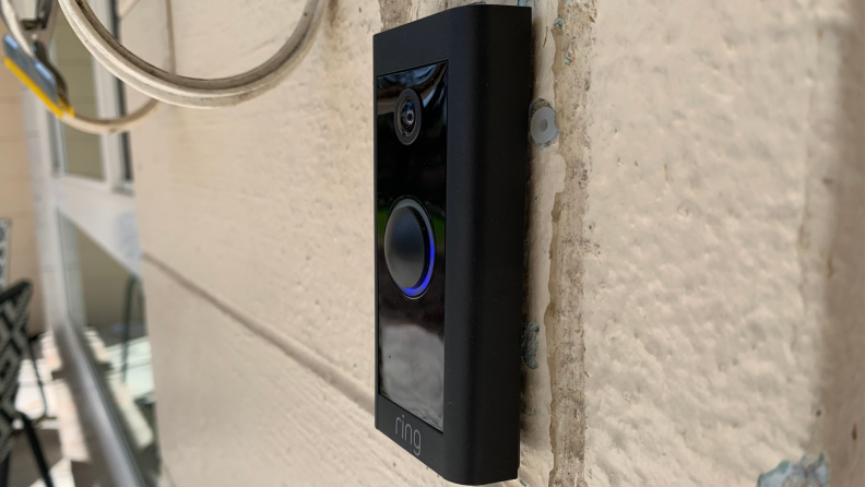 Ring Wired Video Doorbell hanging on a home