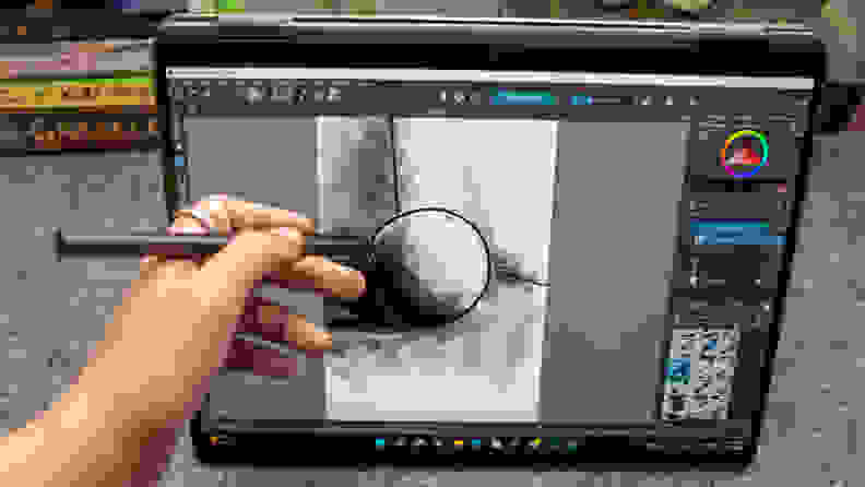 A hand drawing on the laptop's touch screen using the HP pen.