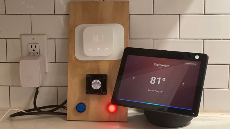 The Amazon Smart Thermostat next to the Echo Show 10.