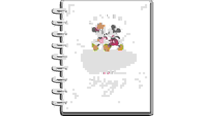 White journal with Disney Mickey and Minnie Mouse on a white background