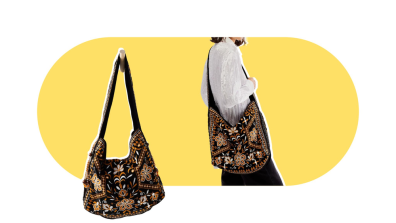 A product shot and a shot of a model holding an embroidered black tote bag.
