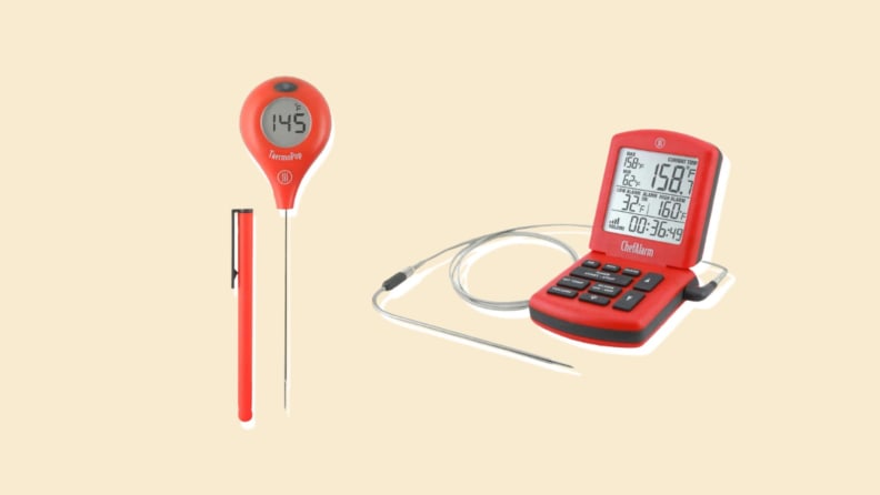 Two meat thermometers on beige background.