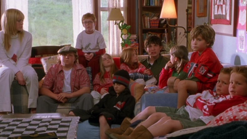 A still from 'Cheaper by the Dozen' featuring all of the Baker kids on a couch.