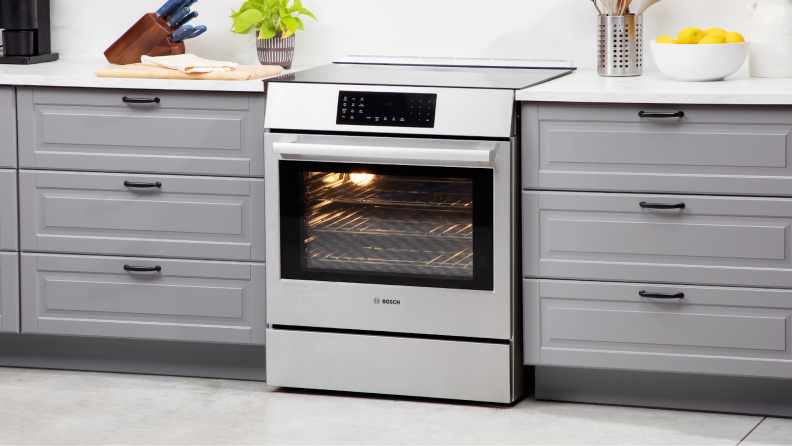 Bosch HII8057U 800 Series Induction Slide-in Range in modern kitchen setting.