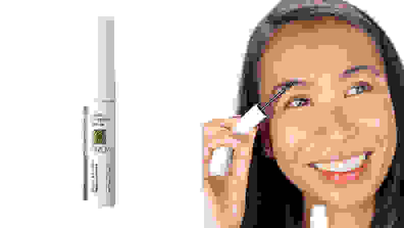 On the left: A small white tub of eyebrow serum on a white background. On the right: A person smiling and looking up while combing through their eyebrows with a spoolie.