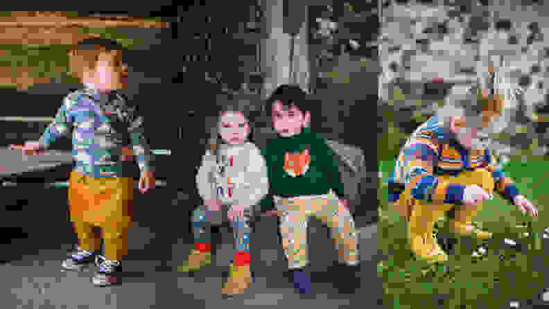 Left: a small boy with a blue sweater and yellow pants looking to the right; Middle: a little girl and boy sitting at the base of a tree looking at the camera. the little girl is wearing a tan sweater with blue polka dot pants, red socks, and boots, while the boy has on a green sweater with an orange fox with yellow pants and dark blue boots; Right: a little girl with blonde hair pulled up in a messy bun wearing a colorful striped sweater and yellow pants and yellow shoes  picking at the flowers in the grass