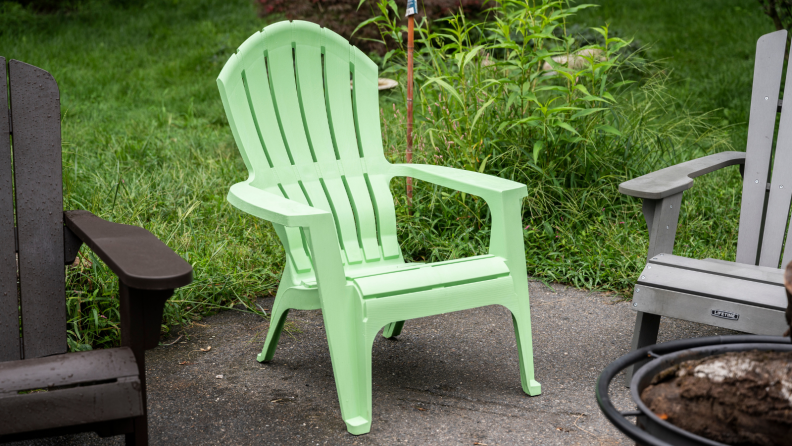 AdamsRealComfort Adirondack Chair in a backyard.