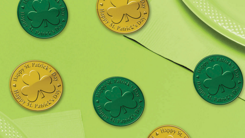 Green and gold coins from Party City on a green background