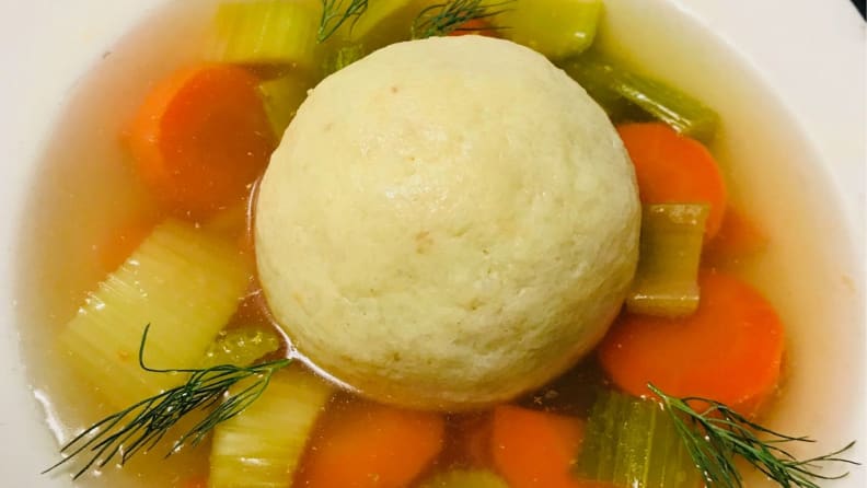 Close-up: A hot bowl of matzo-ball soup.