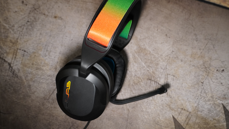 A side view of the JLab Nightfall gaming headset featuring a mic attached to the headset.