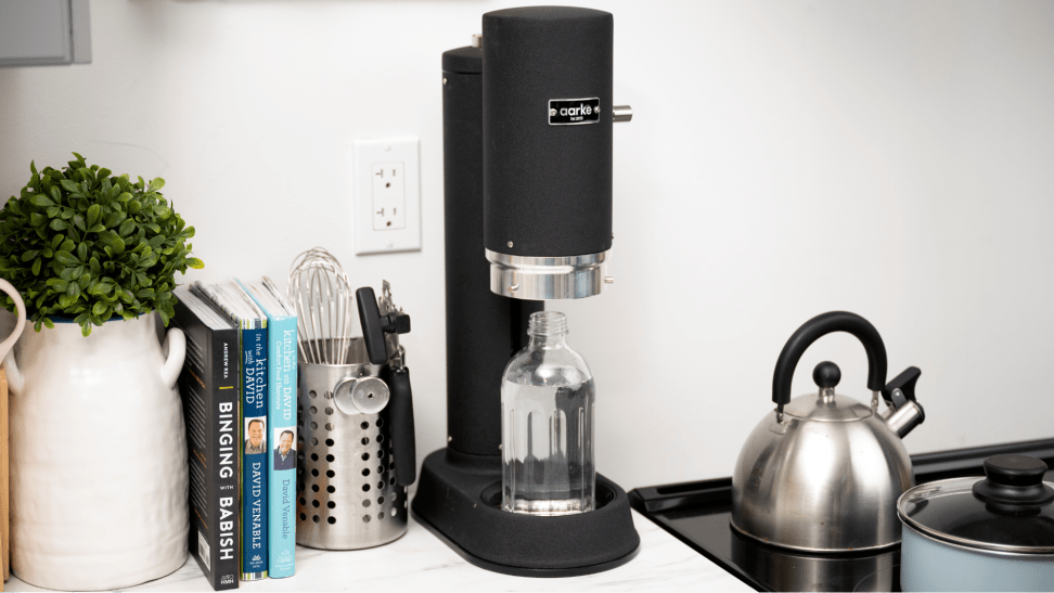 The Aarke Carbonator Pro sits on a kitchen counter.