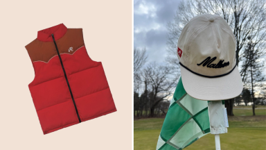 A red puffy vest and a white Malbon golf hat atop a golf flagstick.