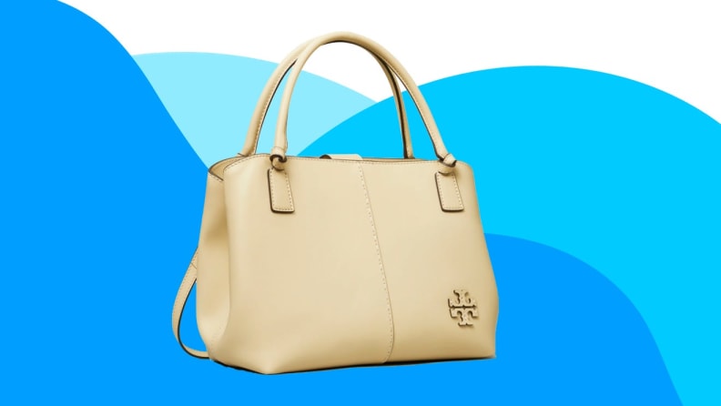 A white handbag against a blue background.