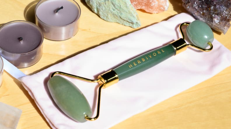 A photo of the Herbivore Jade Facial Roller.