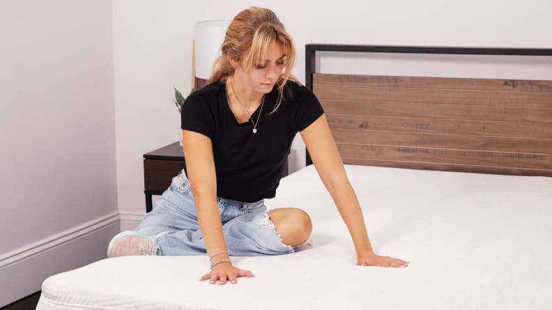 Woman sitting on Casper Snow